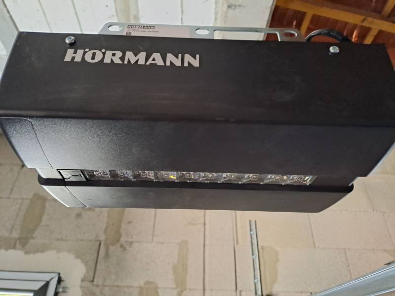 Motorisation Promatic sur porte de garage sectionnelle près de Mauguio