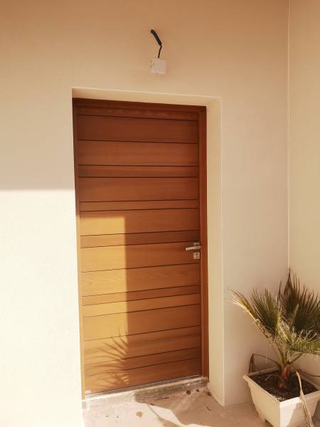 Installation d'une porte Nativ finition miel